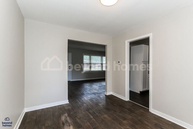 Building Photo - Updated Bungalow with Massive Deck and Fully Fenced Yard!