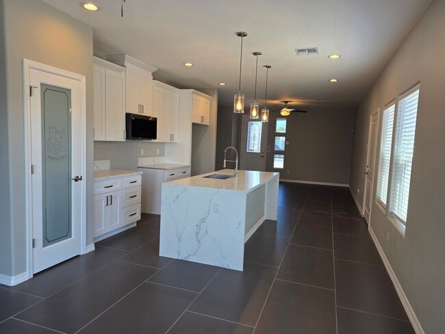 Building Photo - Beautiful new build-Never been lived in with pull through 3 car garage in Fort Mohave AZ