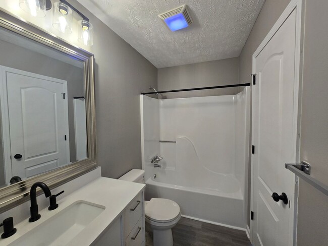 Building Photo - Welcome to Your Stylish New Townhome!