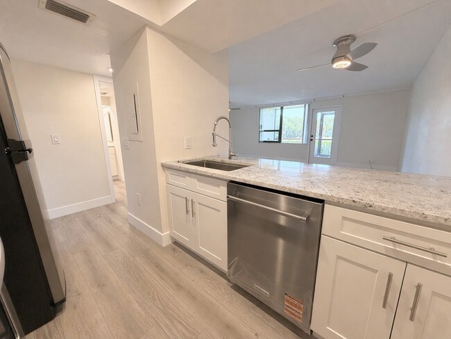 Building Photo - "Charming Clearwater Retreat: Cozy Studio Condo with Scenic Views at Cove Cay!"