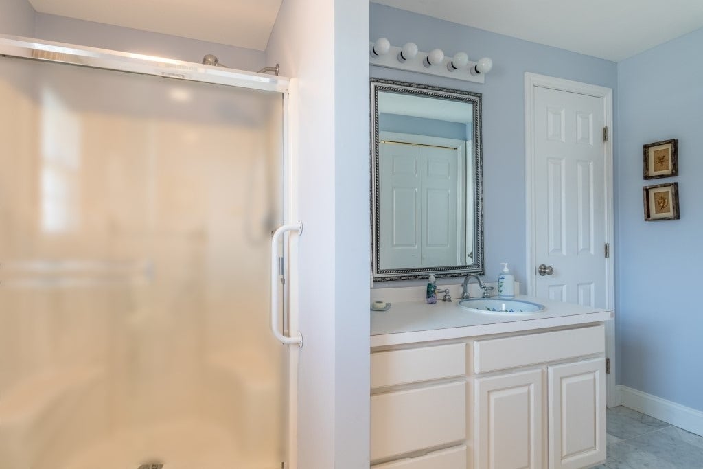2nd full bathroom with large linen closet - 10 Myrica Ave