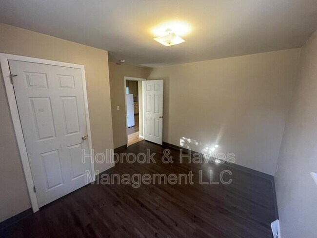 Building Photo - 601 N Bryan Ave