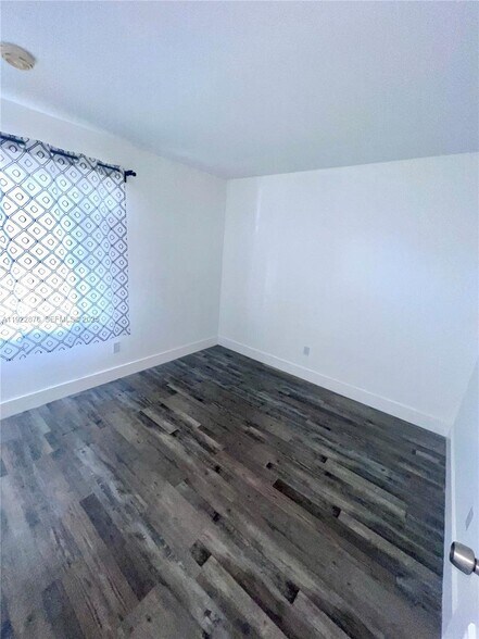 Building Photo - 6715 W 26th Dr