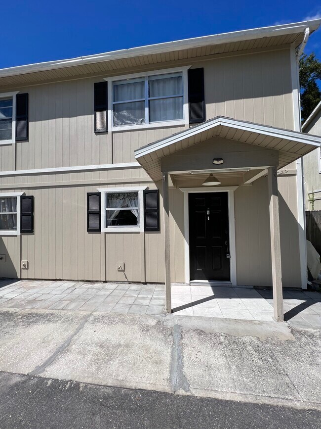 Freshly Painted Front Siding of Townhome - 148 Douglas Rd W