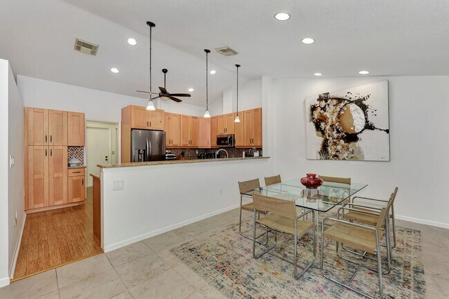 Building Photo - BEAUTIFUL 2 BEDROOM 2 BATHROOM + A DEN VILLA WITH GORGEOUS LAKE VIEWS!