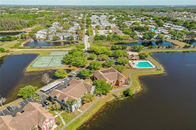 Building Photo - 9158 Lake Chase Island Way