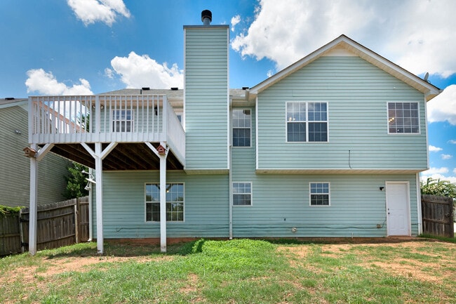 Building Photo - Coing Soon 2/25/26) Impressive 4 Bed, 3 Bath with Home Office!