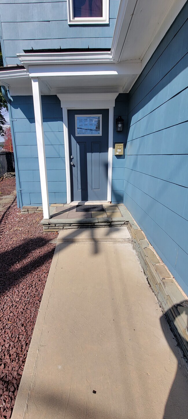 NEW SIDEWALKS, ZERO MAINTENANCE - 212 S Main St