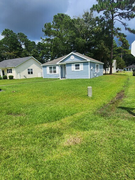 Building Photo - 6662 Wisteria Dr