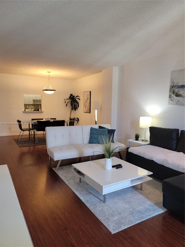 Building Photo - 19380 Collins Ave