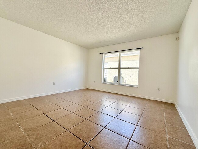 Building Photo - The perfect haven - 4Bedrooms / 2.5Bath family home at Orlando!