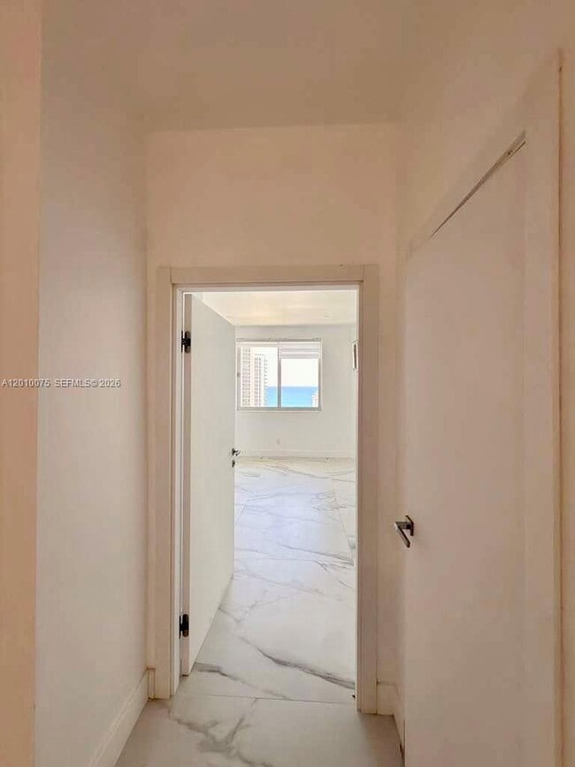 Building Photo - 19370 Collins Ave
