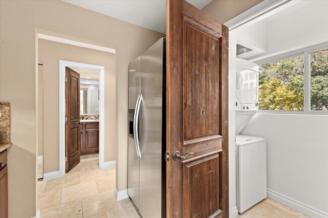 Stacked washer/dryer off kitchen - 935 Genter St