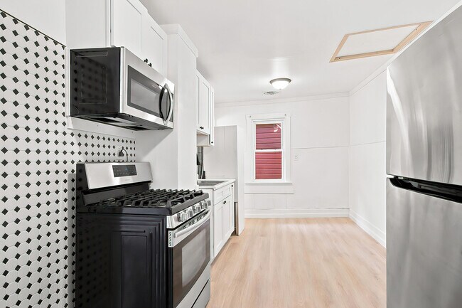 Building Photo - 6929 13th Ave
