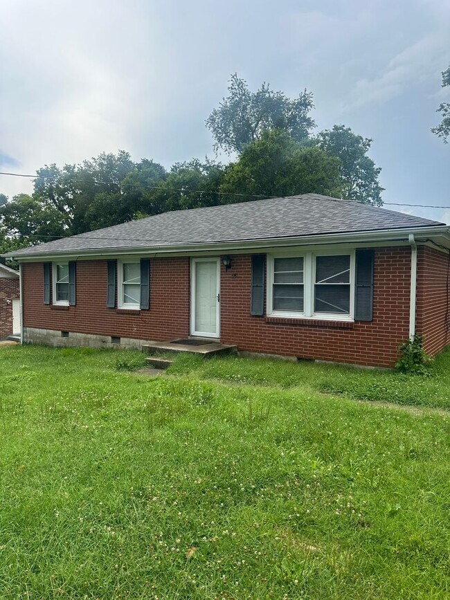 Building Photo - 4 Bedroom and 2 Bath home with large yard