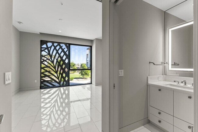 Building Photo - 6587 N Palmeraie Blvd