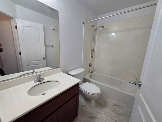 Building Photo - Beautifully Remodeled Tri Story Home located in a Gated Community ...