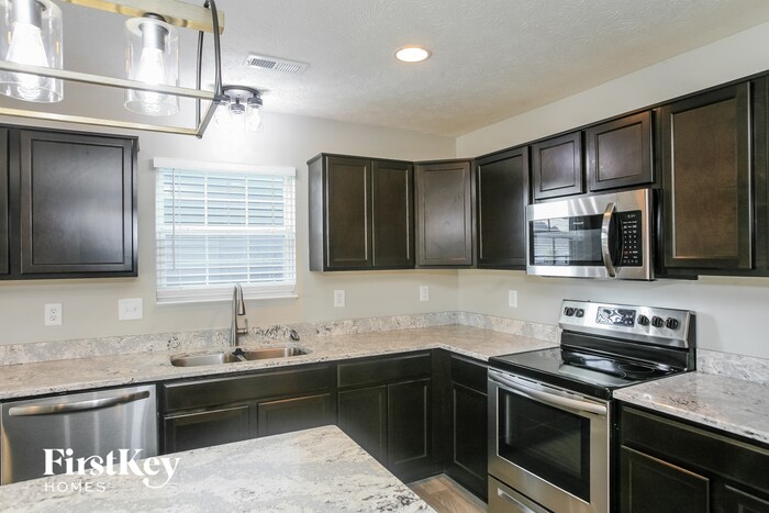 Building Photo - 5846 Wintersweet Ln