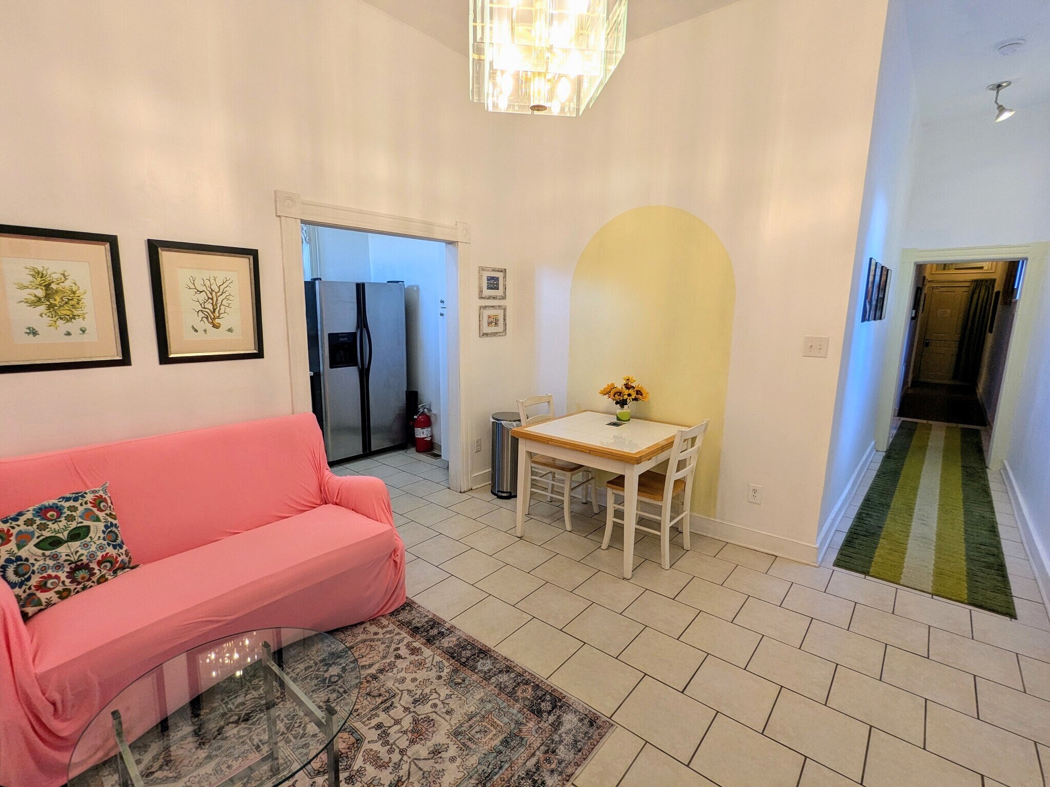 When you enter the Apartment the living/dining area and kitchen is on your left, bedrooms ahead. - 1816 W Grace St