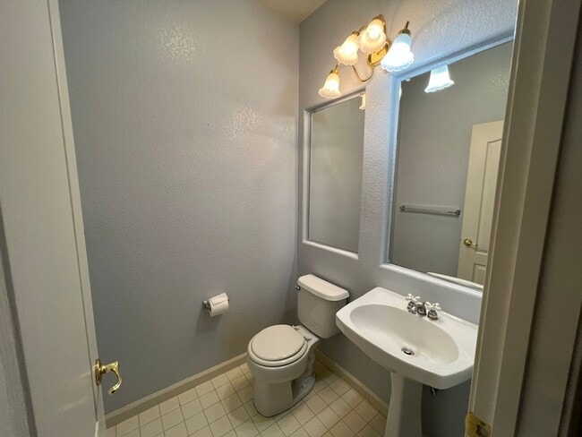 Building Photo - 4 bedrooms with 3 car garage in Rose Lane ...