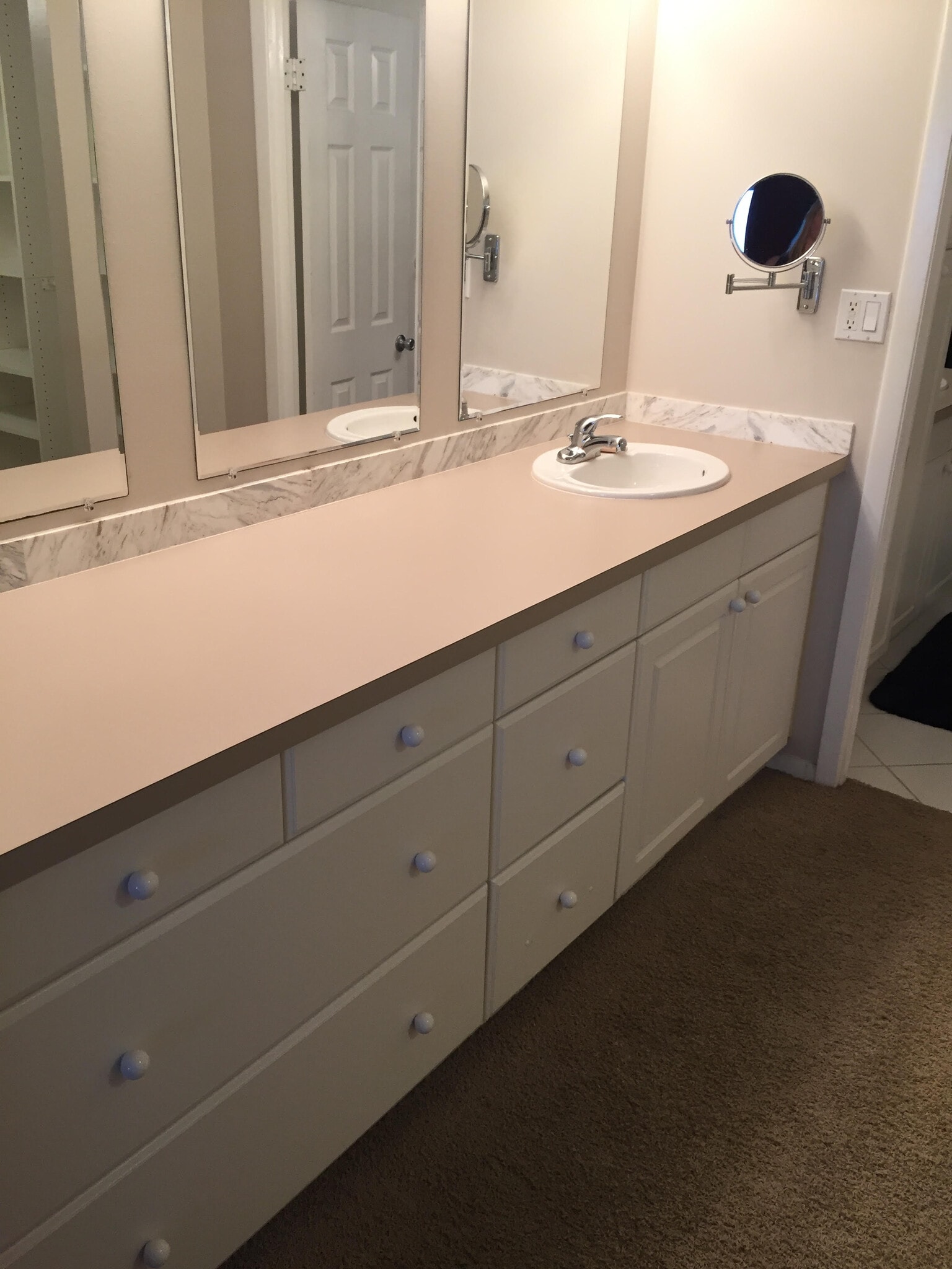 secondary master sink in front of walk-in closet - 2131 NW Lakeview Dr