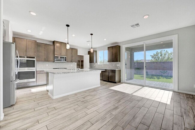 Building Photo - Gated community Located within the Valley Vista Master Plan. 4 Bed 3 Bath features and Open and i...