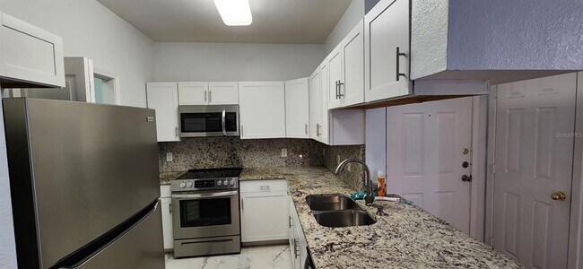 Building Photo - 13015 Sanctuary Cove Dr