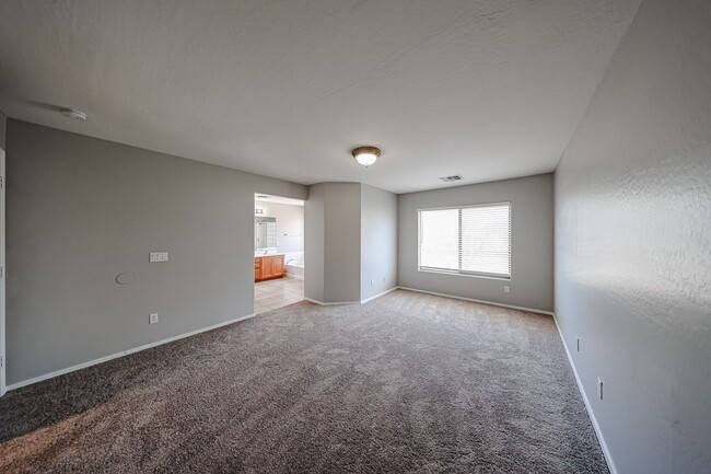 Building Photo - Welcome to this spacious 4 bedroom, 2.5 ba...