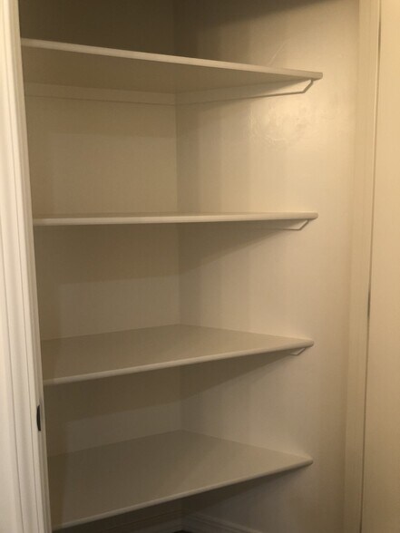 Linen closet in bathroom - 2100 E Olympic Ave