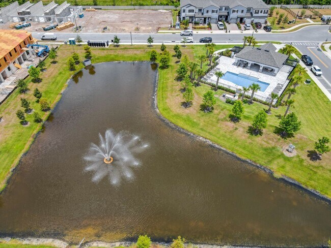 Building Photo - Lease this 3BR End-Unit Townhome in Gated Community with Water View!