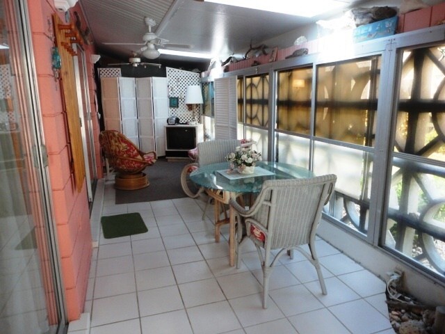 Building Photo - 1BR + Den with Murphy Bed/2BA Single level villa on the Beach!