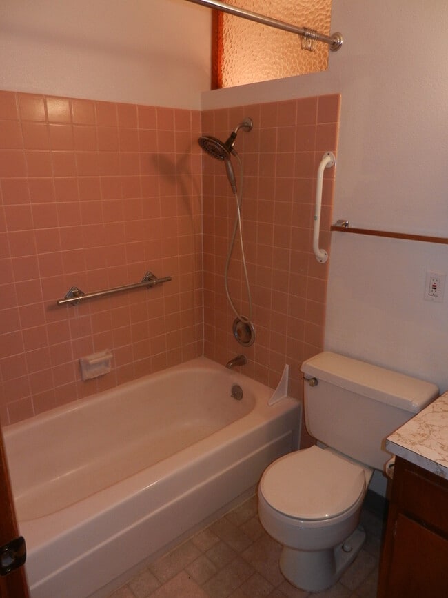 Building Photo - Well-Located Home with Fireplace, Fenced Yard & 2-Car Garage