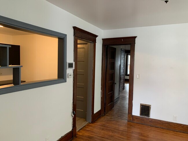 Dining room looking into kitchen and hallway - 207 Lafayette Ave