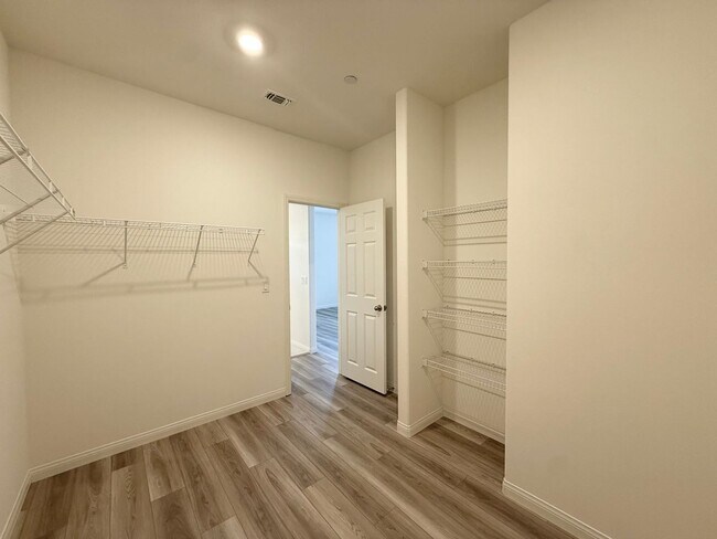 Building Photo - Modern Brand New Summerlin Home with 5 Bedrooms, Loft & Upgraded Finishes