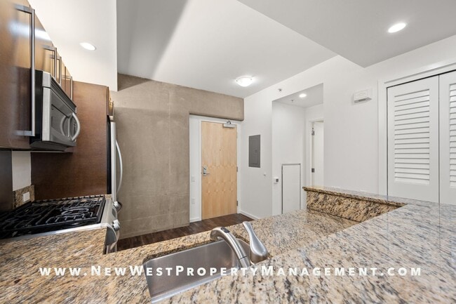 Building Photo - Modern Icon one bedroom in the heart of East Village! Small Pet OK! Available Now! 1 Pkng Space I...