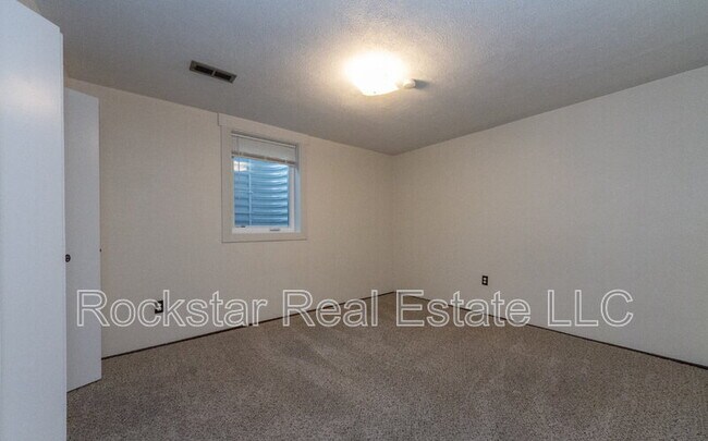 Building Photo - 12125 N Normandie St