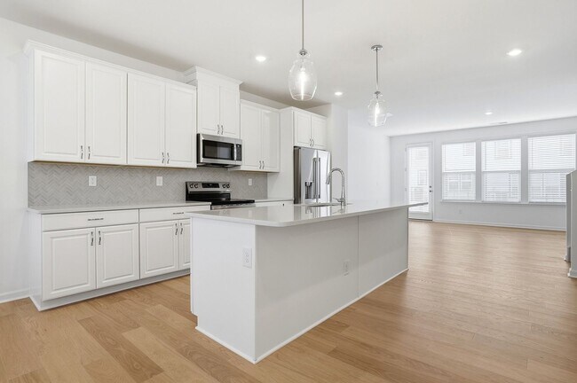 Building Photo - Brand-New Townhome in the University area at Senata at Research Park!
