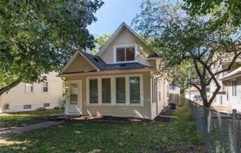 Building Photo - Charming 4-Bed Home with Gleaming Hardwood Floors & 2 Full Baths in Minneapolis!
