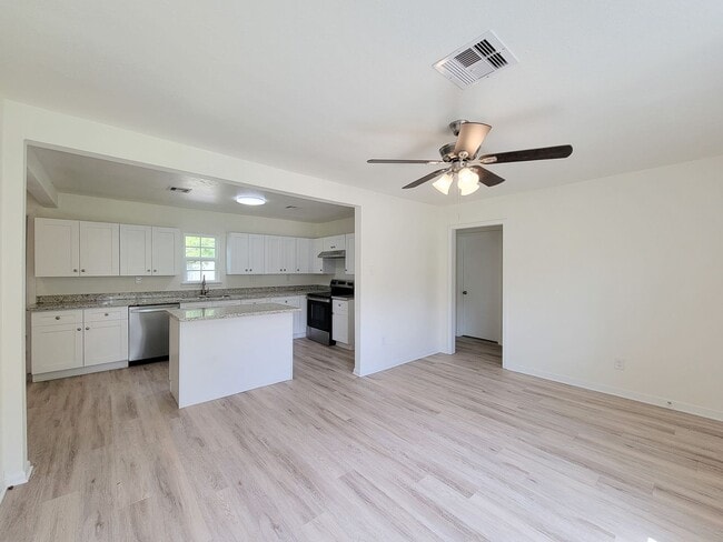 Building Photo - REMODELED 4 BEDROOM 2 BATH LEASE HOME IN A...