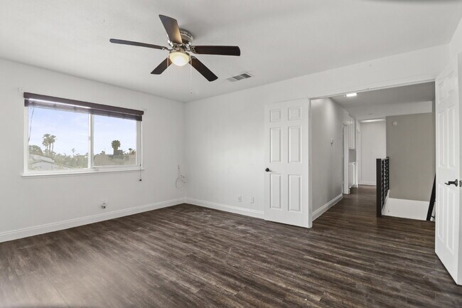 Building Photo - Welcome to your entertainers dream home with solar and pool service included!