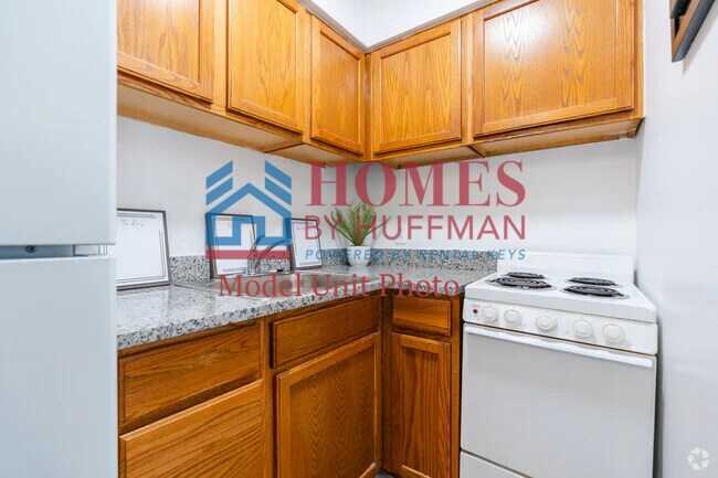 Building Photo - One Bedroom Apartment | Laundry Facility | Utilities Included