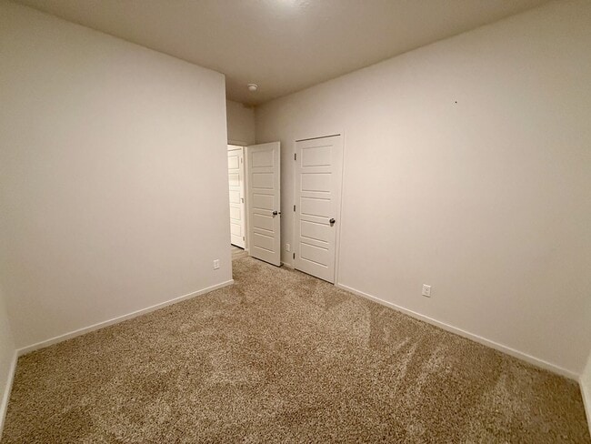 Building Photo - New Construction 4 Bed Mead School District Rancher w/ Fully-Fenced Yard and Attached Garage!