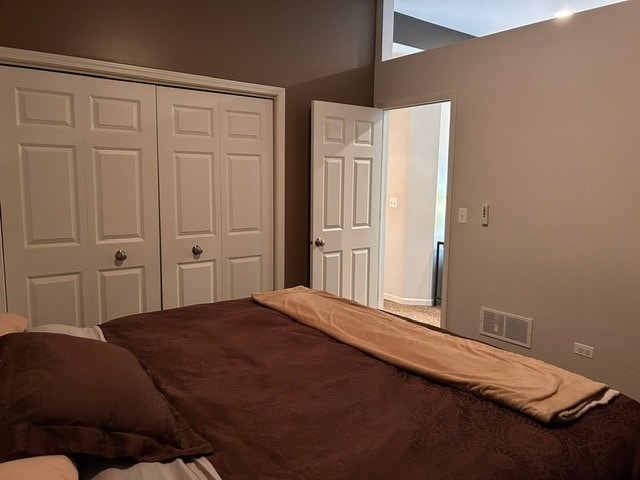 King size bed with large closet and armoire. - 616 Windham Ln
