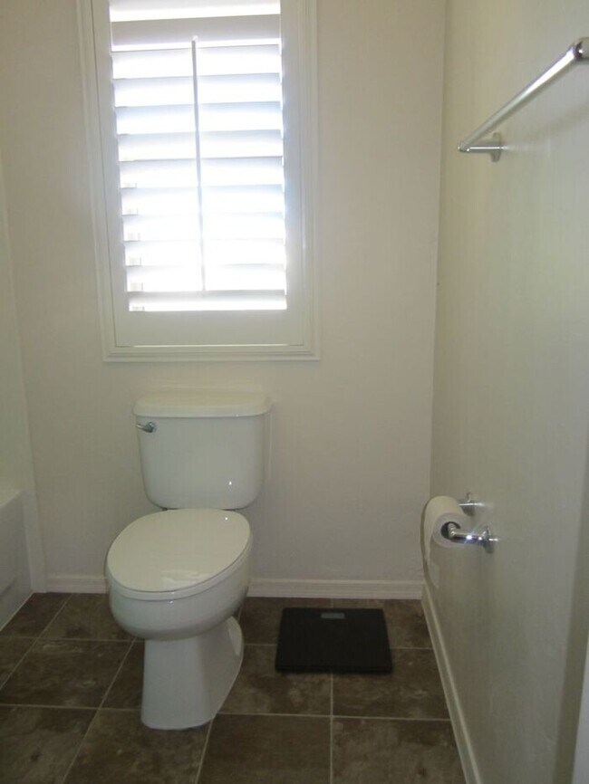 Building Photo - Adorable 2 story patio style with three spacious bedrooms and two full baths upstairs