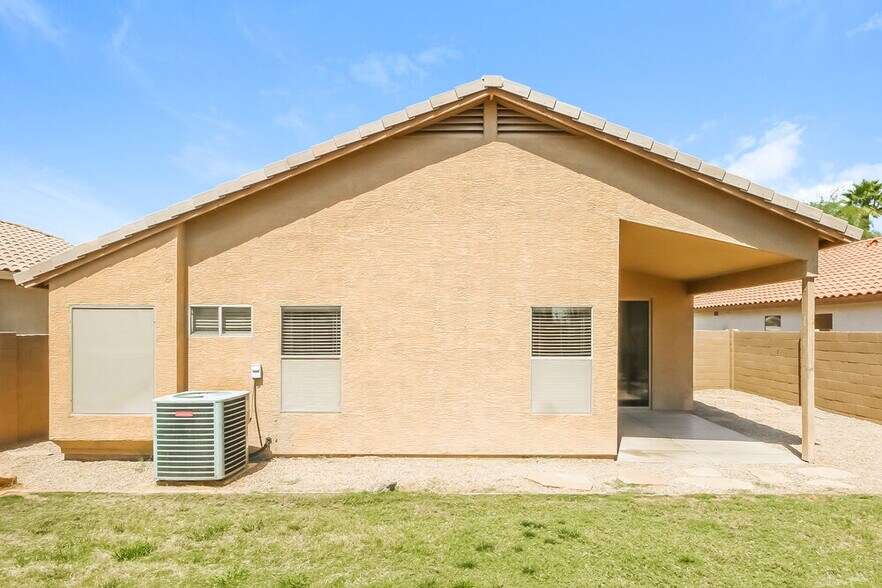 Building Photo - 9909 E Onza Ave