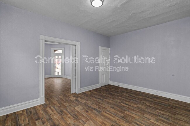 Building Photo - 3402 Dunnica Ave