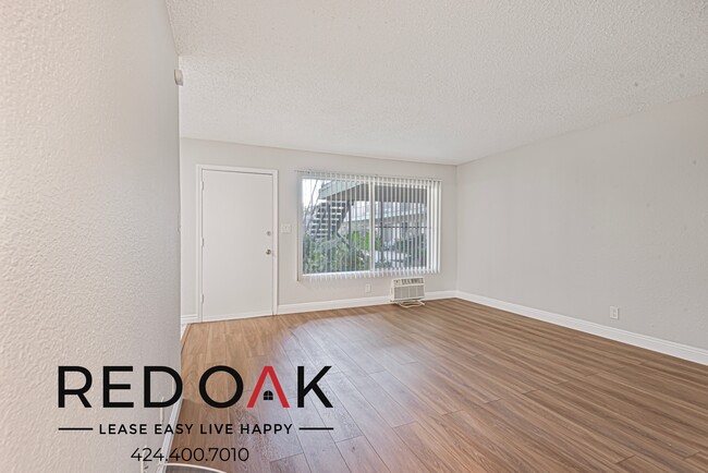 Building Photo - Cheerful One Bedroom with Beautiful Floors...