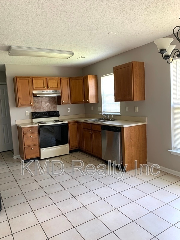 Building Photo - 4010 Woolcott Ave