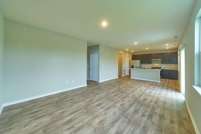 Building Photo - 4 Bedroom at Trotter's Landing in Camby With Pond View!