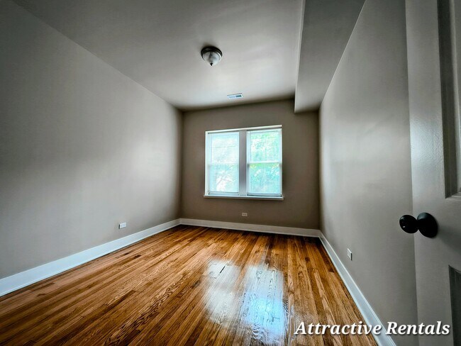 Building Photo - 1359 S Kildare Ave